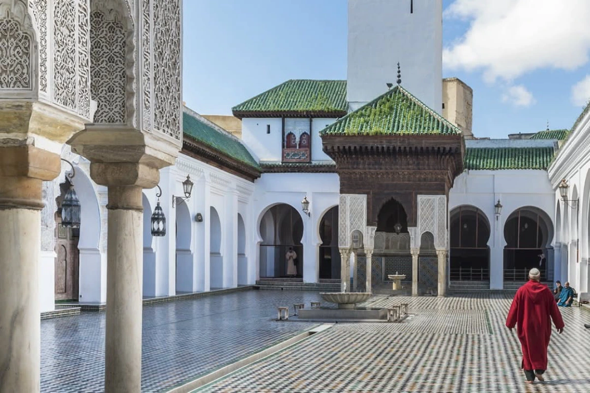 Intricate Islamic architecture inside Bou Inania Madrasa in Fes, Morocco