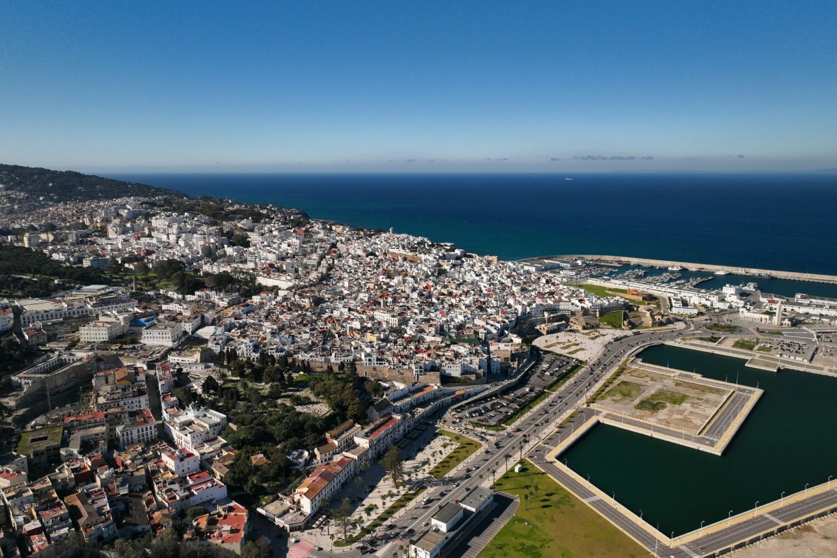 Panoramic daytime view of Tangier city with its coastline and urban landscape.