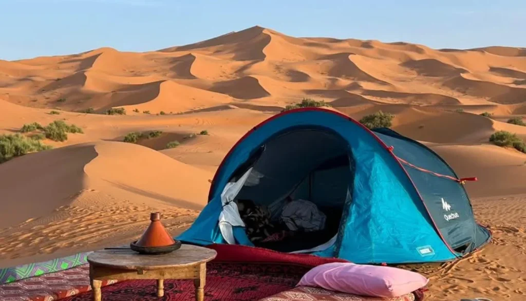 Mobile desert camp setup among Merzouga dunes